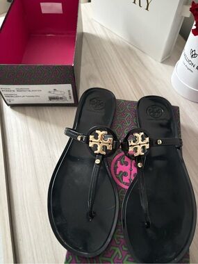 Tory Burch Black Jelly Thong Sandals with Gold Logo